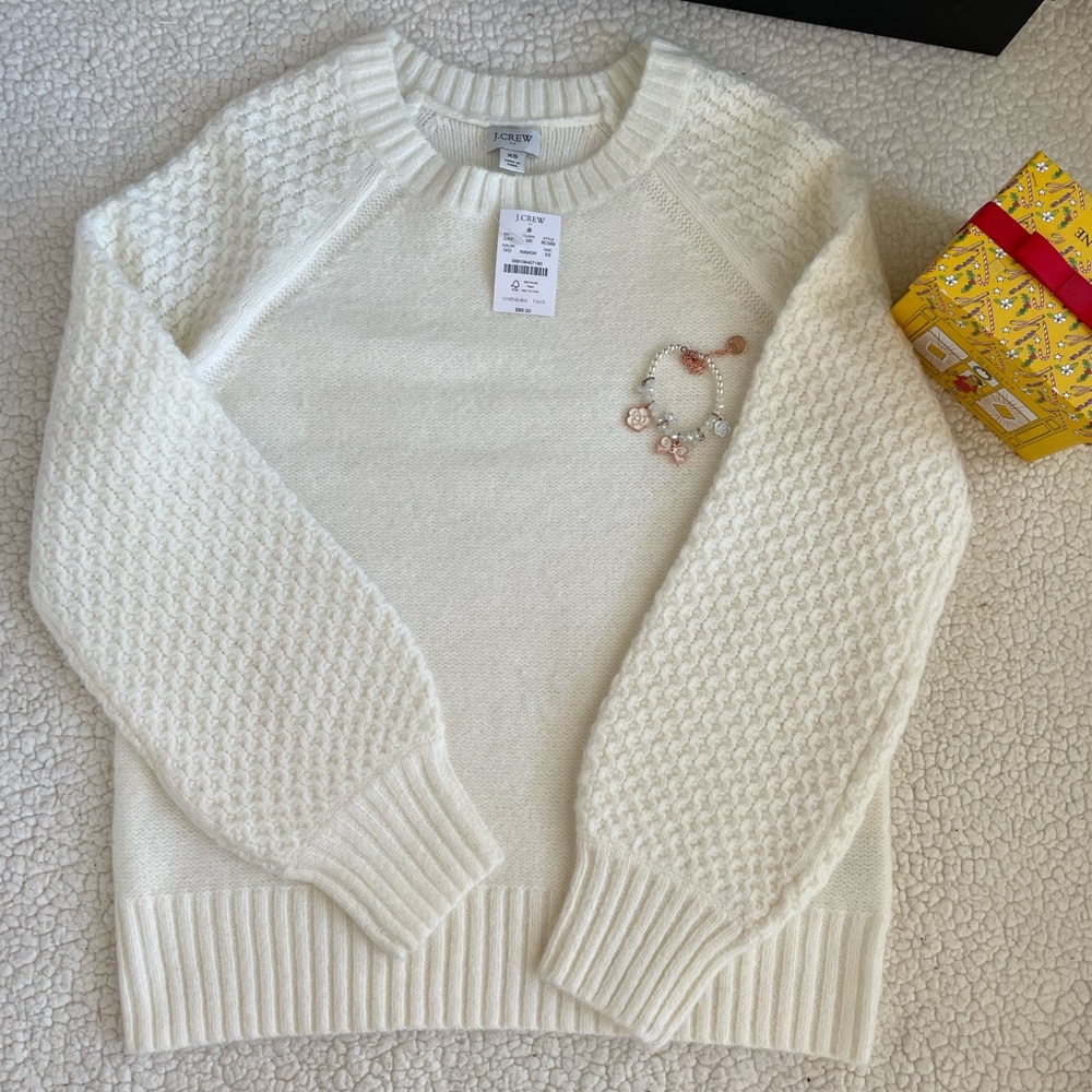 J crew sweater brand new color is cream ,off white .